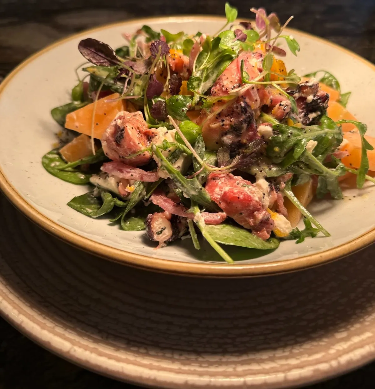 Octopus salad with leaves and citrus