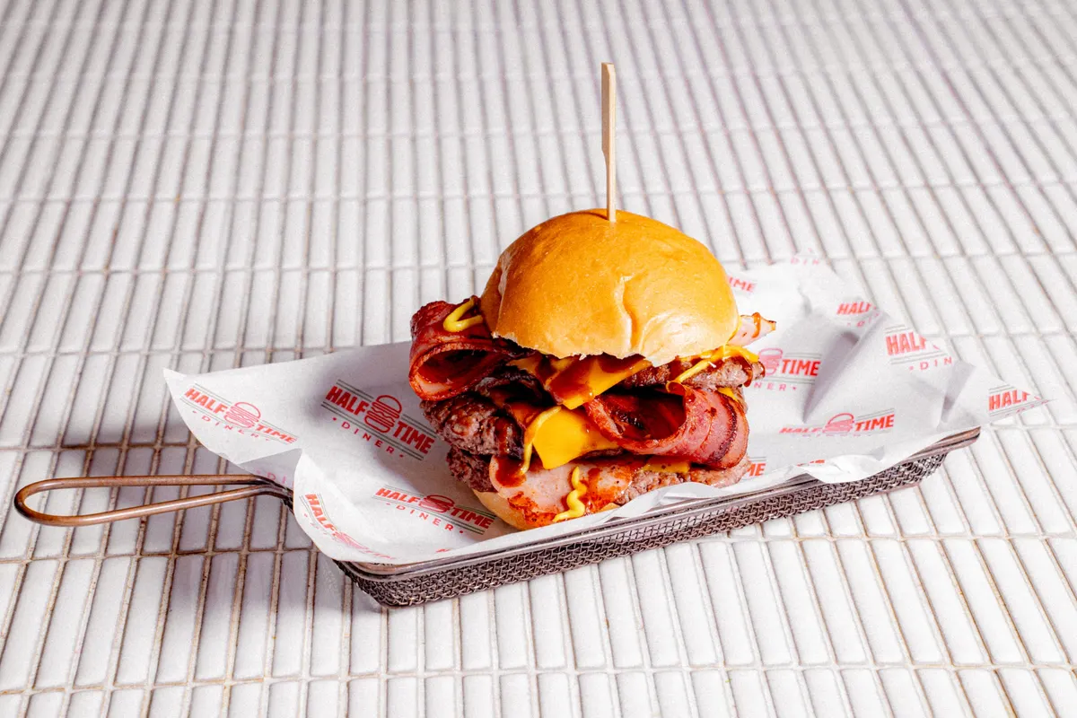 Bacon cheeseburger on diner paper